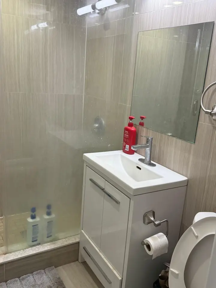 Bathroom with sink, toilet and shower