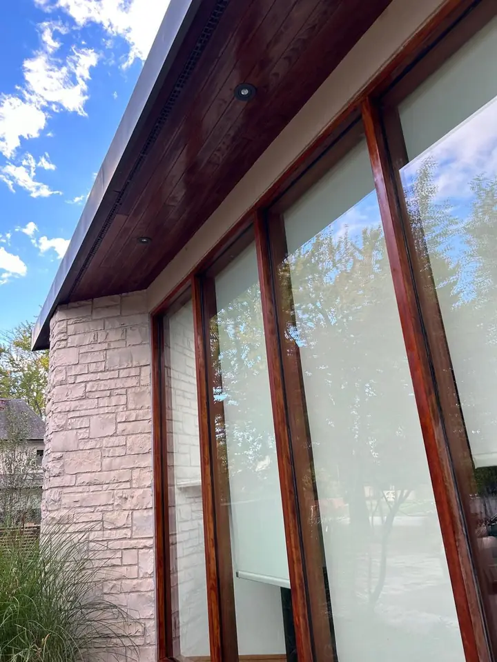 Exterior windows and doors under blue sky