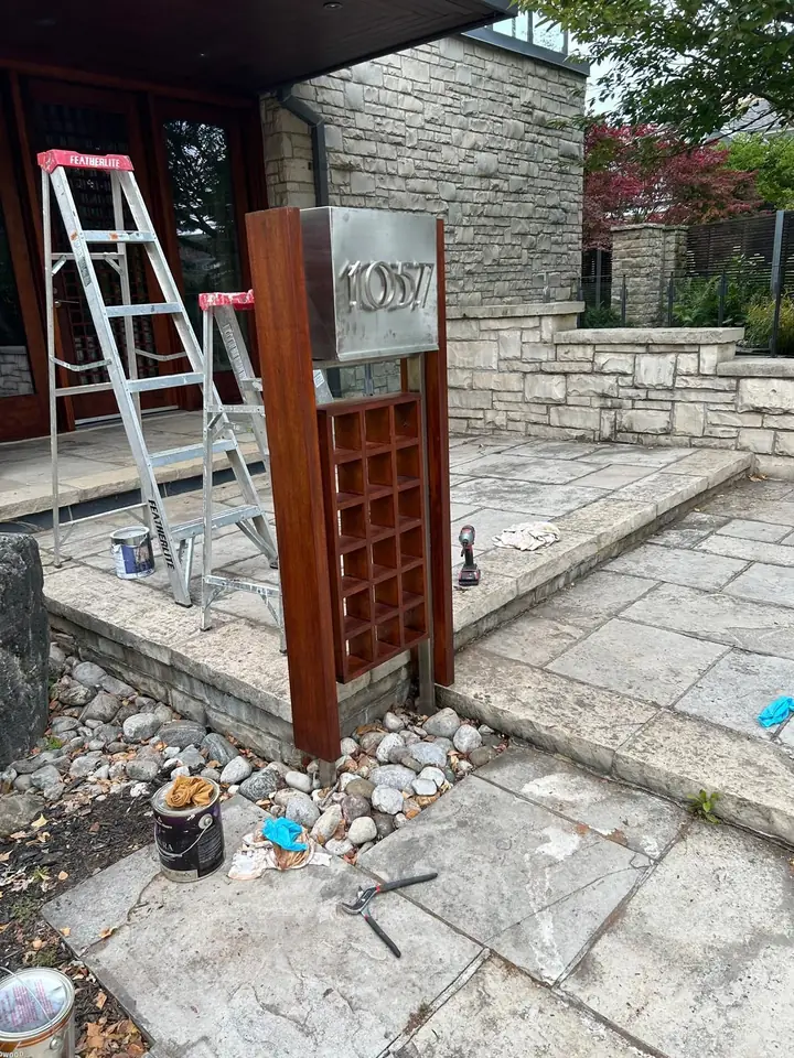 Painting the wooden mailbox post