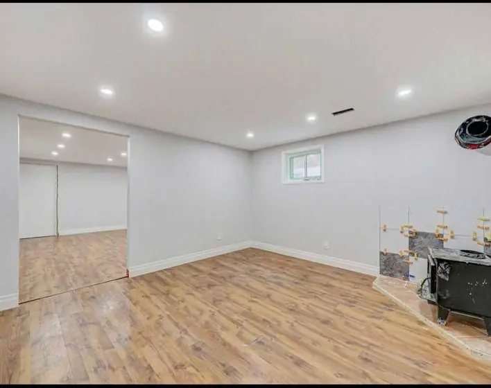 Basement living area with wood stove