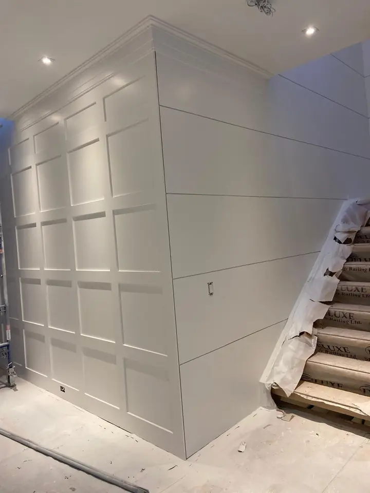 Smooth white wall at the staircase